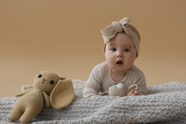 cute baby with stuffed animal scaled e1720113165539